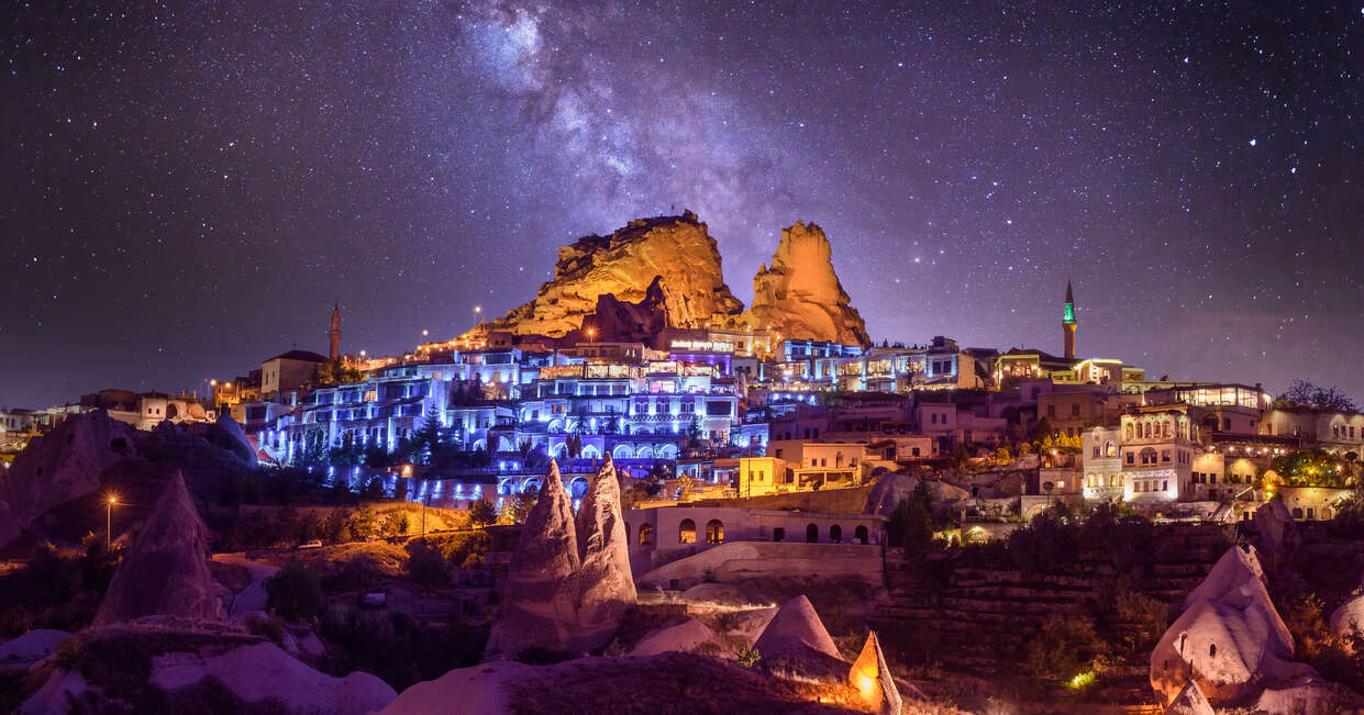 Uchisar Castle at night. It`s small, but beautiful town in Cappadocia, near Goreme